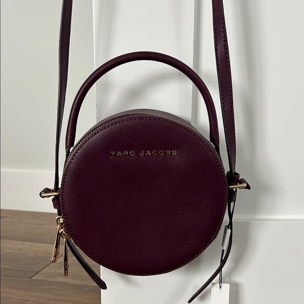 Marc Jacobs Round Leather Crossbody in Burgundy with Gold Hardware